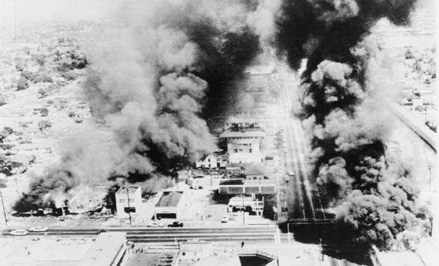 Burning buildings in Los Angeles during the Watts Riots in August, 1965.