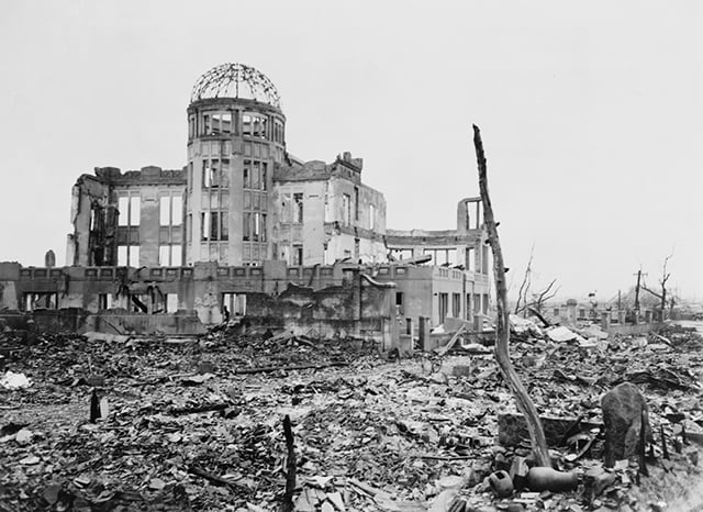 Wrecked framework of the Museum of Science and Industry in Hiroshima, Japan, shortly after the dropping of an atomic bomb on August 6th, 1945. (Photo via Shutterstock.com)