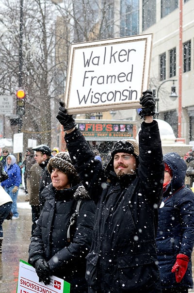 MADISON, WI: Protesters in Wisconsin during a rally against Governor Scott Walker's budget bill on 26 February, 2011. (Photo via Shutterstock)