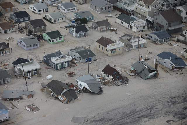 Aerial photo of damaged homes along New Jersey shore after Hurricane Sandy. The increase of violent superstorms like Sandy have been attributed to global climate change. (Photo: Greg Thompson/US Fish and Wildlife Service)