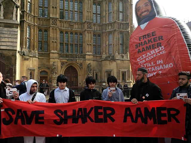 Shaker Aamer's three sons, the youngest of whom he has never met, outside the Houses of Parliament on March 17 ahead of debate on his detention without charge or trial at Guantánamo. (Aisha Maniar)