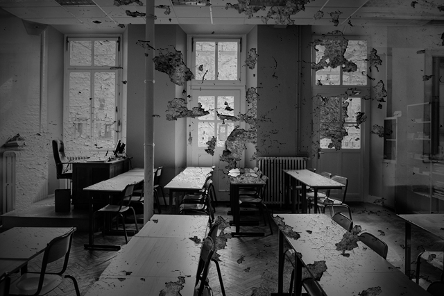 The fact that authorizers enjoy almost complete autonomy - not only from state regulations but also from public control through elected school boards - is a feature of the anti-regulatory environment in which charters have grown, rather than a bug. (Photo: Empty Classroom via Shutterstock; Edited: LW / TO)