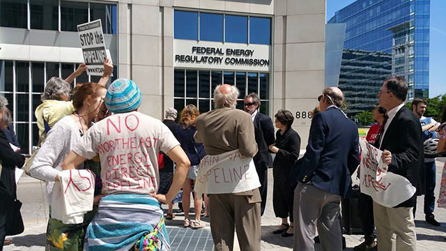 Protesters remain at FERC after being barred from Commission meeting. (Photo: BXE)