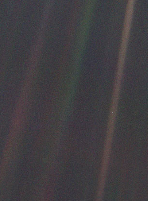 This narrow-angle color image of the Earth s a part of the first ever portrait of the solar system taken by Voyager 1. From Voyager's great distance, Earth is a mere point of light, less than the size of a picture element even in the narrow-angle camera.