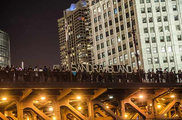 The Chicago Light Brigade and Project NIA lifted up Sandra Bland's name over the Chicago River, on July 28, 2015. (Photo: Sarah Jane Rhee)