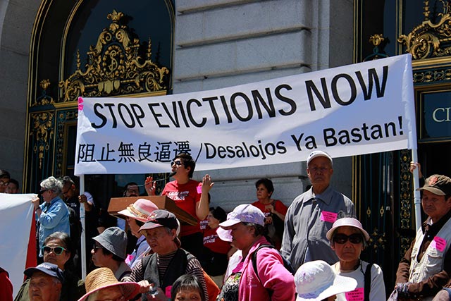 Tenants and activists hold press conference outside San Francisco City Hall supporting a tenant-protection bill. (Photo: Adam Hudson)