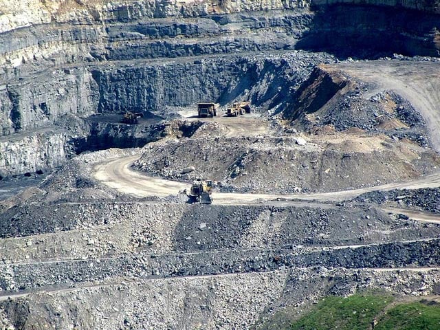 A mountaintop removal mine in Wise County, Virginia. The federal Bureau of Prisons wants to build a prison over a similarly strip-mined parcel of land in neighboring Kentucky which is still being drilled for gas, and which is located amid a habitat for dozens of endangered species.