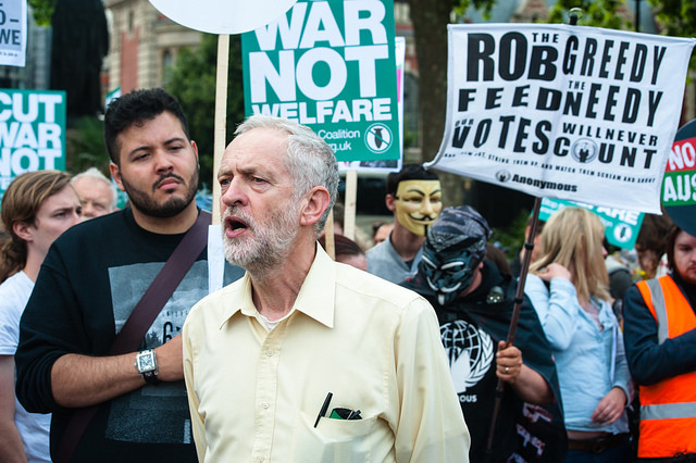 8 July, 2015: Recently elected Labour Party leader Jeremy Corbyn demonstrates in the People's Assembly Against Austerity with DPAC, Friends of the Earth, the Green Party, and other organisations in Parliament Square to protest Chancellor George Osborne's 'emergency' budget. (Photo: Jas*n)