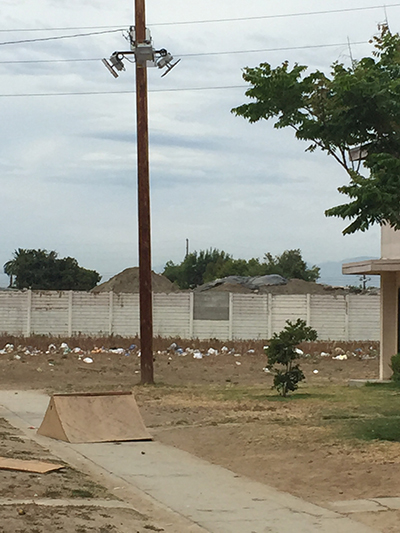 As much as 33,600 cubic yards of contaminated soil is being removed from a cleanup site at Jordan Downs in Watts, Los Angeles. Community advocates say the cleanup doesn’t meet health and safety standards. (Photo: Legal Aid Foundation)