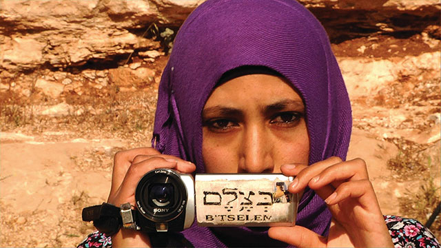 Using cameras provided by the Israeli human rights organization B’Tselem, Palestinian women have been filming the actions of Israeli soldiers and civilians in order to document routine human rights abuses. (Photo: In The Image)