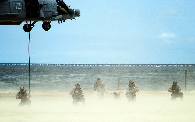 Navy SEALs conduct a capabilities exercise at Joint Expeditionary Base Little Creek-Fort Story on Virginia Beach, VA, July 21, 2012. Beginning mid-January, Navy SEALS will be conducting war games across Washington State's coastal areas, including through public and private property.