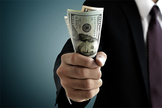 (Photo: Bribe Money via Shutterstock; Edited: LW / TO)
