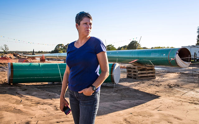 Julia Trigg Crawford at a TransCanada construction site across from her farm in Sumner, Texas, on Oct. 14, 2012. She tried to stop TransCanada from taking her land but was unable to prevent the company from using eminent domain. (Photo: Julie Dermansky)