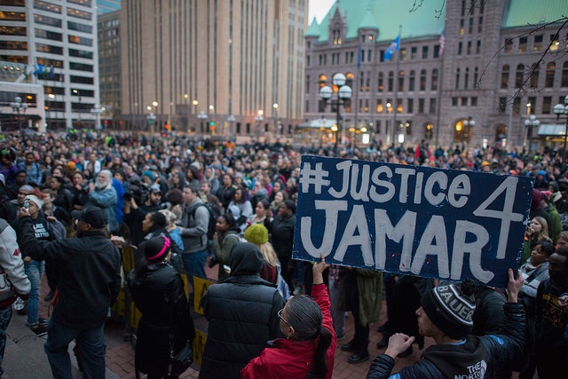 Protesters shut down the 4th Precinct in Minneapolis, Minnesota on March 30, 2016, in opposition to Hennepin County Attorney Mike Freeman's announcement that police officers Mark Ringgenberg and Dustin Schwarze will not be charged for the murder of Jamar Clark. (Photo: Fibonacci Blue)