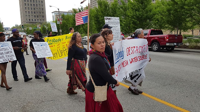 The visiting Native delegation marches through the streets of St. Louis with local organizers. (Photo: Kelly Hayes)