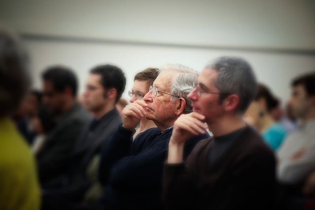 Noam Chomsky sits in an audience during a lecture at Harvard Universityin New York City on April 1, 2010. (Photo: Jeanbaptisteparis)