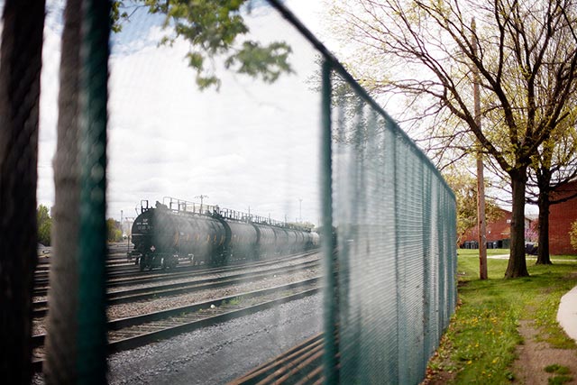 Railroad tanker cars, on the track adjacent to Ezra Prentice Homes on Saturday, May 7, 2016. (Photo: Earthjustice)