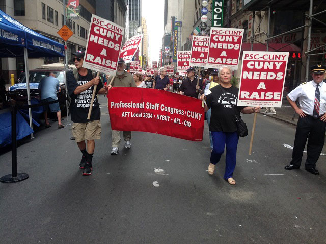 Professional Staff Congress members march during the 2015 Labor Day parade on September 12, 2015, to highlight their lack of a contract. (Photo: Brandon Jordan)