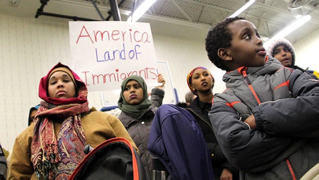 Minnesota residents gather on Sunday night to resist the Muslim ban. (Photo: Christopher Zumski Finke)