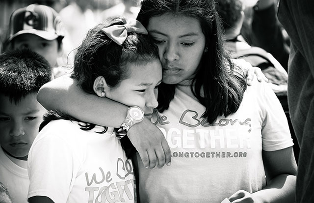 Washington, DC, April 13, 2017: Elena and her friend Leah of the We Belong Together Kids Caravan support one another during their final action in front of the White House. (Photo: Steve Pavey)