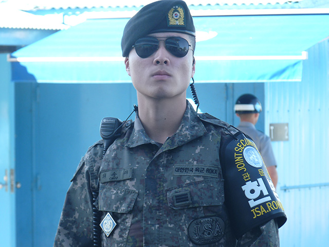A South Korean Army officer stand guard at the Demilitarized Zone/Joint Security Area outside the Military Armistice Commission buildings along the tense border. (Photo: Jon Letman)