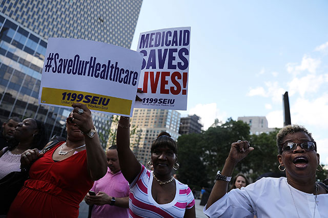 People protest against the Senate healthcare bill on June 28, 2017 in New York City. (Photo: Spencer Platt / Getty Images)