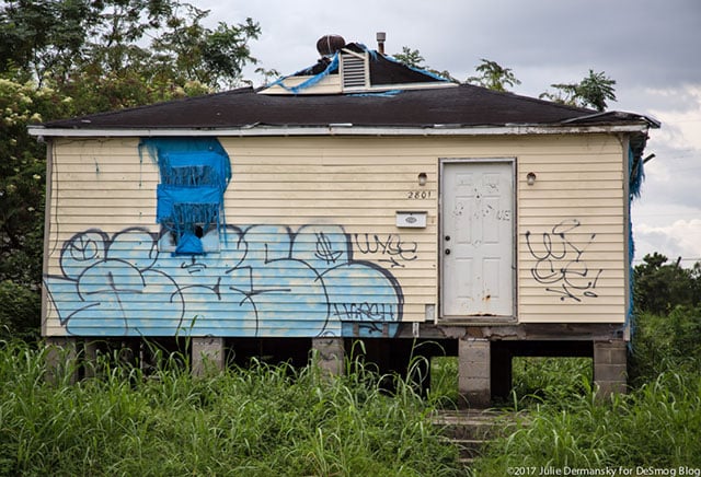 A blighted home covered in graffiti in New Orleans' Ninth Ward. (Photo: Julie Dermansky)