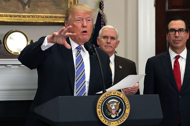 Donald Trump delivers remarks before signing the 'Section 232 Proclamations' on steel and aluminum imports with Vice President Mike Pence and Treasury Secretary Steven Mnuchin in Roosevelt Room the the White House March 8, 2018, in Washington, DC. (Photo: Chip Somodevilla / Getty Images)