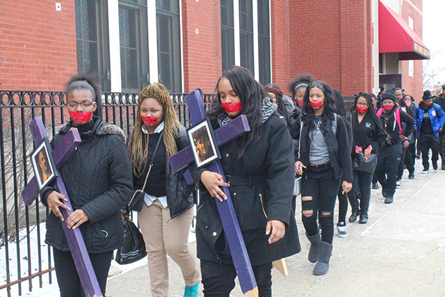Students from North Lawndale College Prep created imagery that represents what their community has lost to gun violence, as well as the silencing they experience. (Photo: Ervin Lopez)