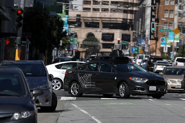 An Uber self-driving car drives down 5th Street on March 28, 2017 in San Francisco, California. Cars in Uber's self-driving cars are back on the roads after the program was temporarily halted following a fatal crash in Tempe, Arizona on March 23, 2018. (Photo: Justin Sullivan / Getty Images)